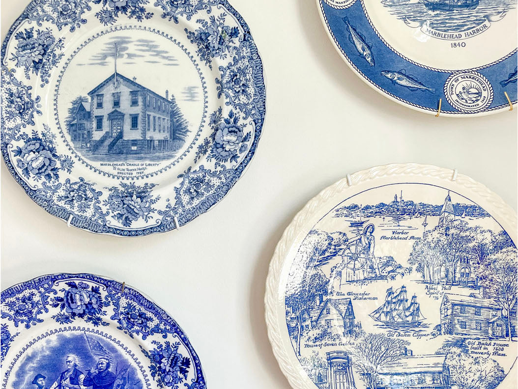Wood bowl filled with green and glass insulators