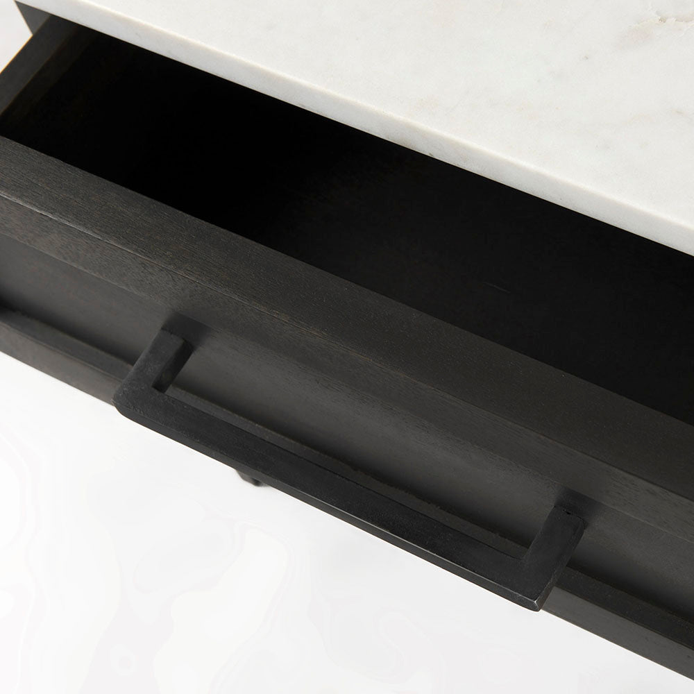 Square end table with black iron base, wood shelf and drawer and marble top on a white background