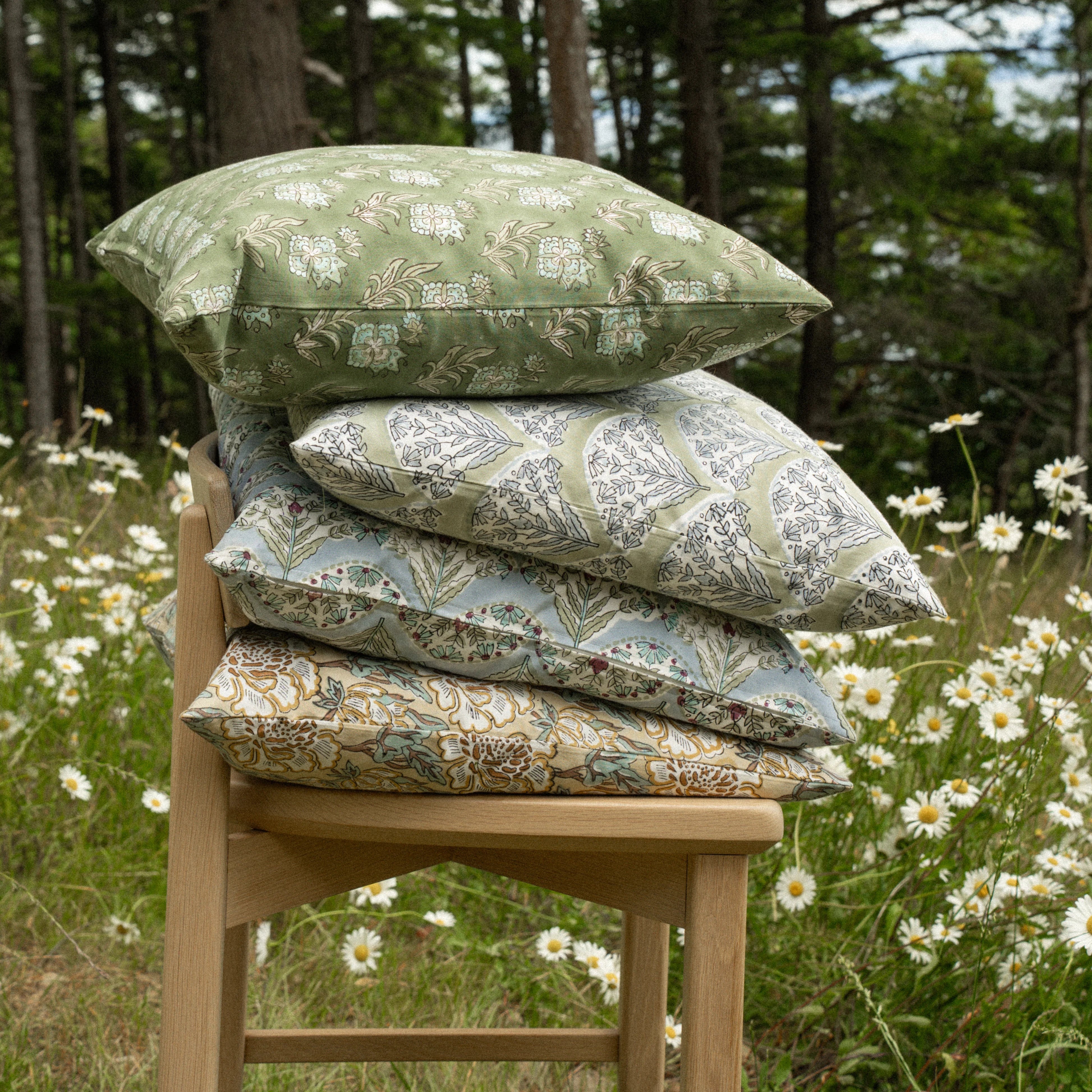 Elowen Block Print Pillow on a chair at Addison West