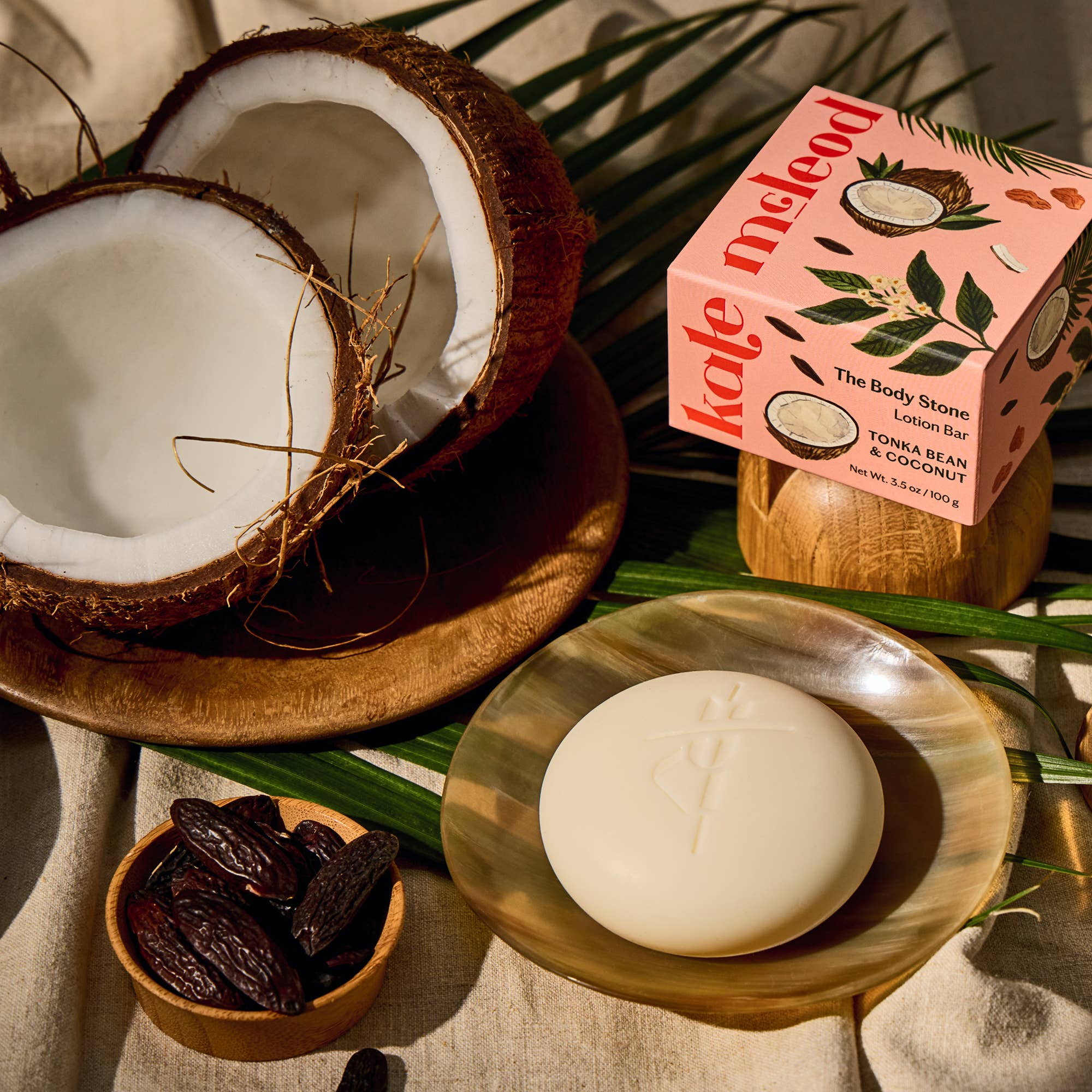 Tonka Bean & Coconut Deep Moisturizing Lotion Bar on a table at Addison West