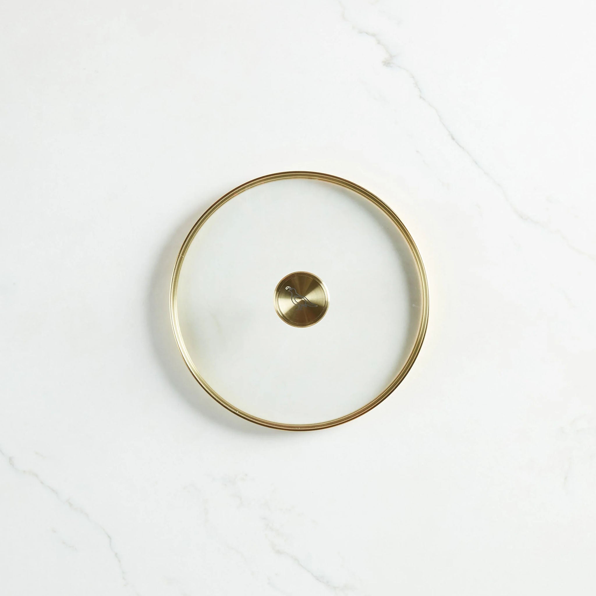 Smithey 12" Glass Lid on a marble surface