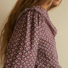 Chloe Blouse in Wine on a white background at Addison West