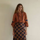Leonor Blouse in Caramel on a white background at Addison West
