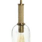 Close up of Bronson Glass Pendant, Long in Brass on a white background at Addison West
