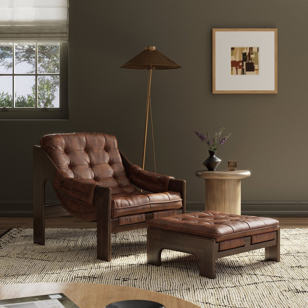 Four Hands Halston Chair & Ottoman in Heirloom Sienna in a green living room at Addison West