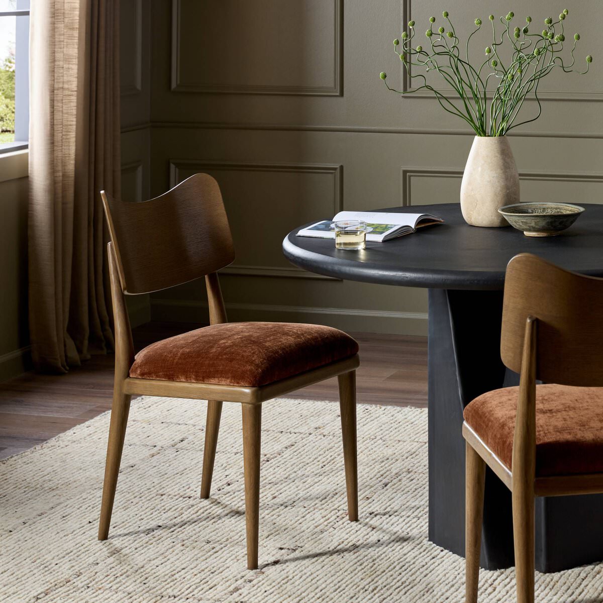 Four Hands Marley Dining Chair in Altair Sienna in a dining room at Addison West