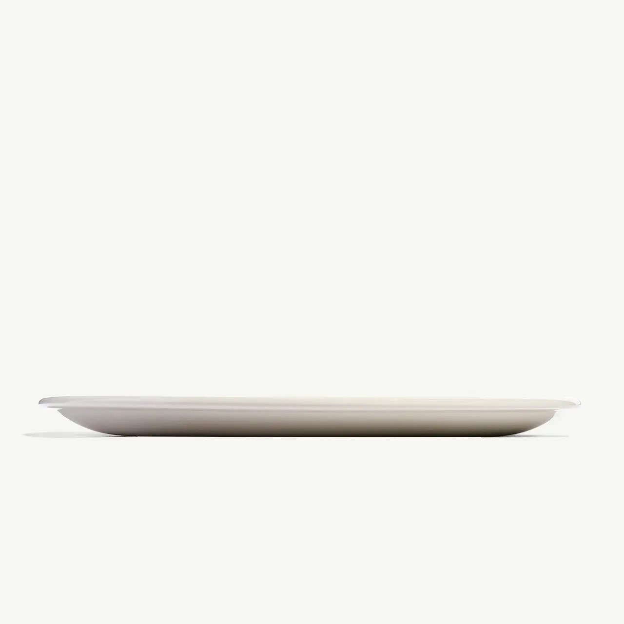 Made In 10.5" Dinner Plate on a white background at Addison West