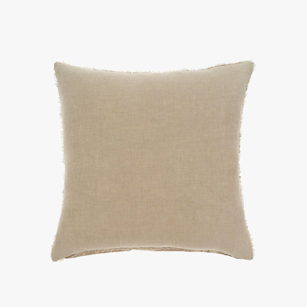 Indaba brand square linen pillow with frayed edges in light khaki color on a white background