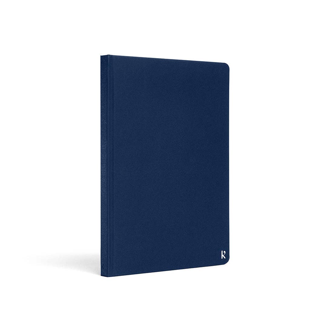 Karst A5 Hardcover Lined Notebook in Navy on a white background at Addison West
