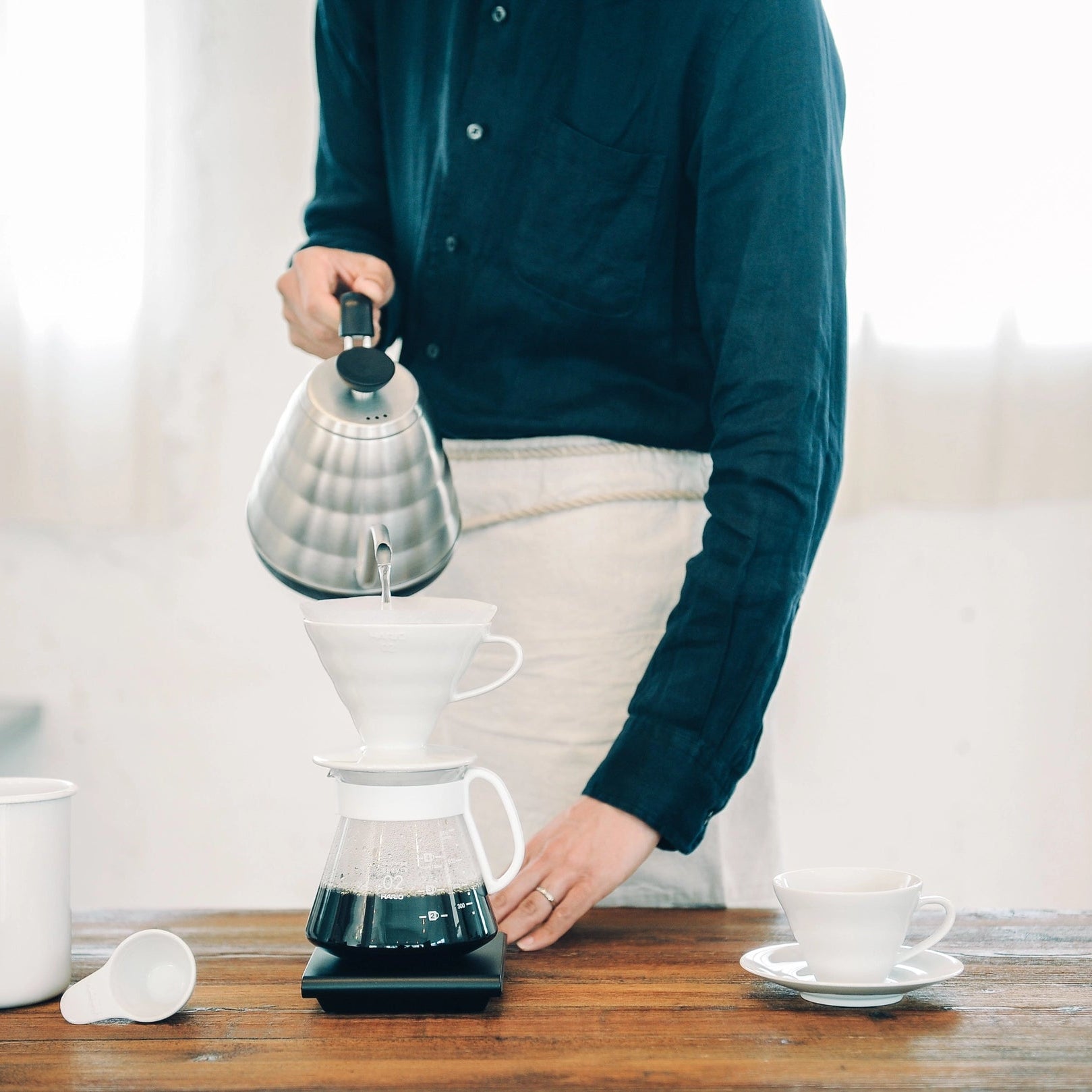 Hario V60 Ceramic Pour Over Coffee Set on a table at Addison West