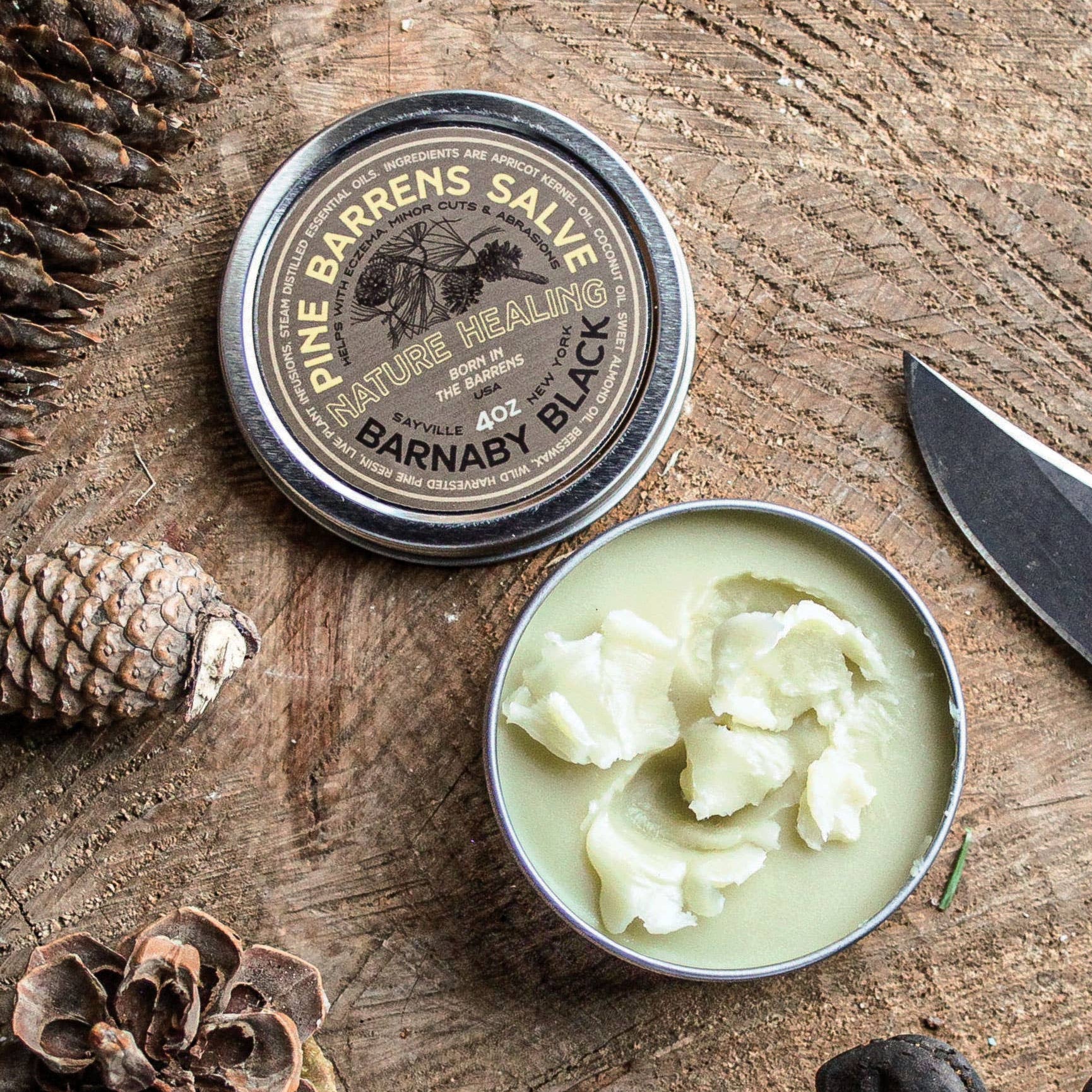 Pine Barrens Salve on a wood table at Addison West