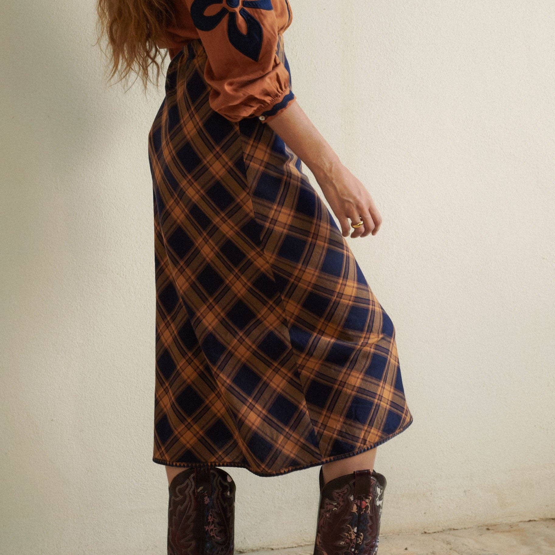 Plaid Midi Skirt on a white background at Addison West