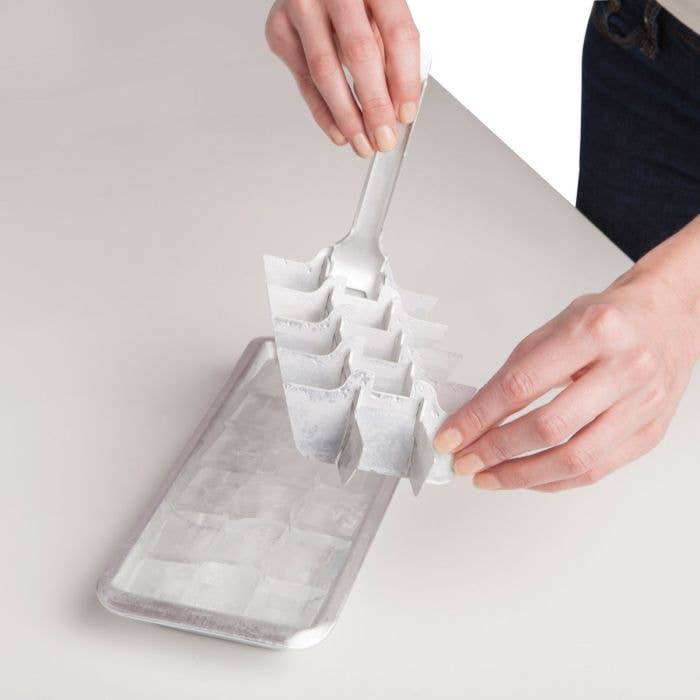 Vintage Lever Ice Tray on a white background at Addison West