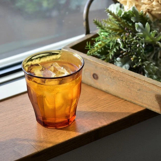 Duralex Le Picardie® Amber Glass Tumbler on a table at Addison West