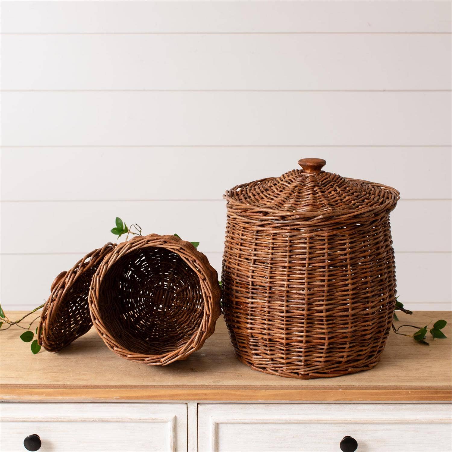 Wicker Storage Baskets With Lids on a table at Addison West