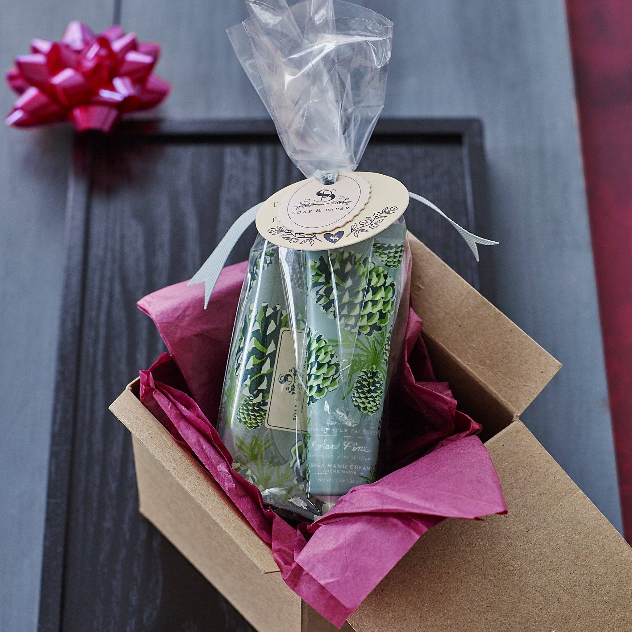 Roland Pine Hand Cream & Soap Gift Set on a black background at Addison West