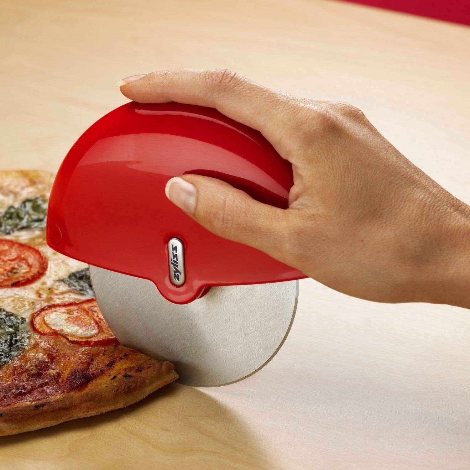 Pizza Slicer Wheel on a table at Addison West