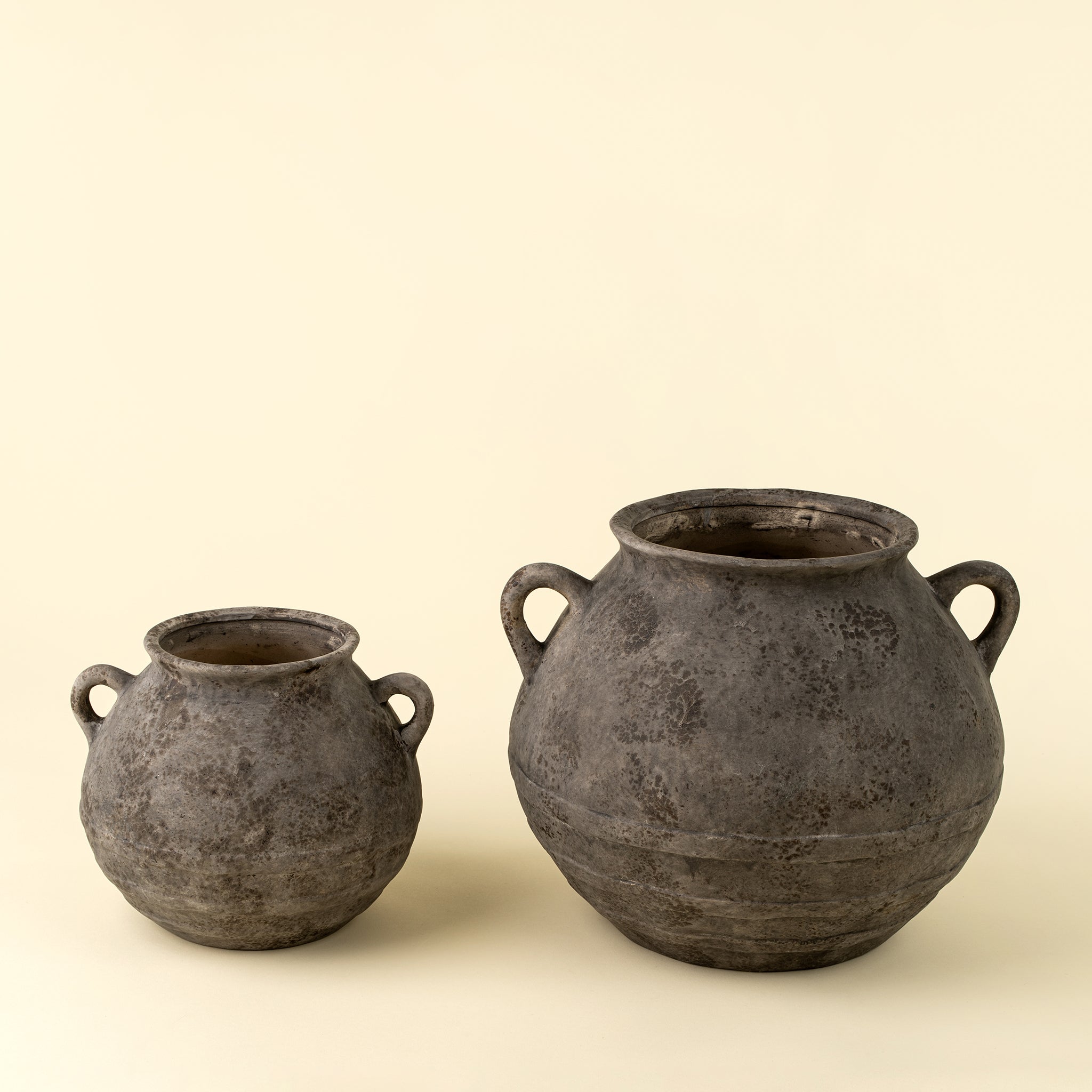 Large Artifact Stoneware Vase on a beige background at Addison West