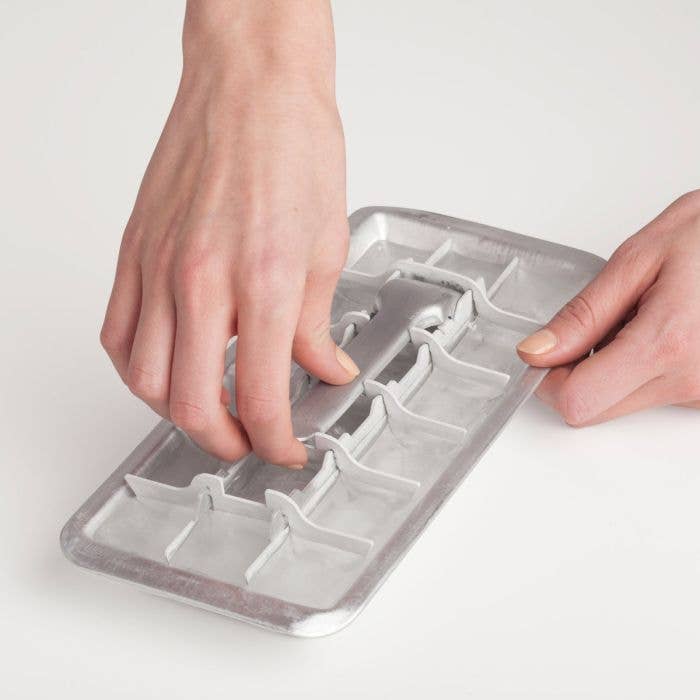Vintage Lever Ice Tray on a white background at Addison West
