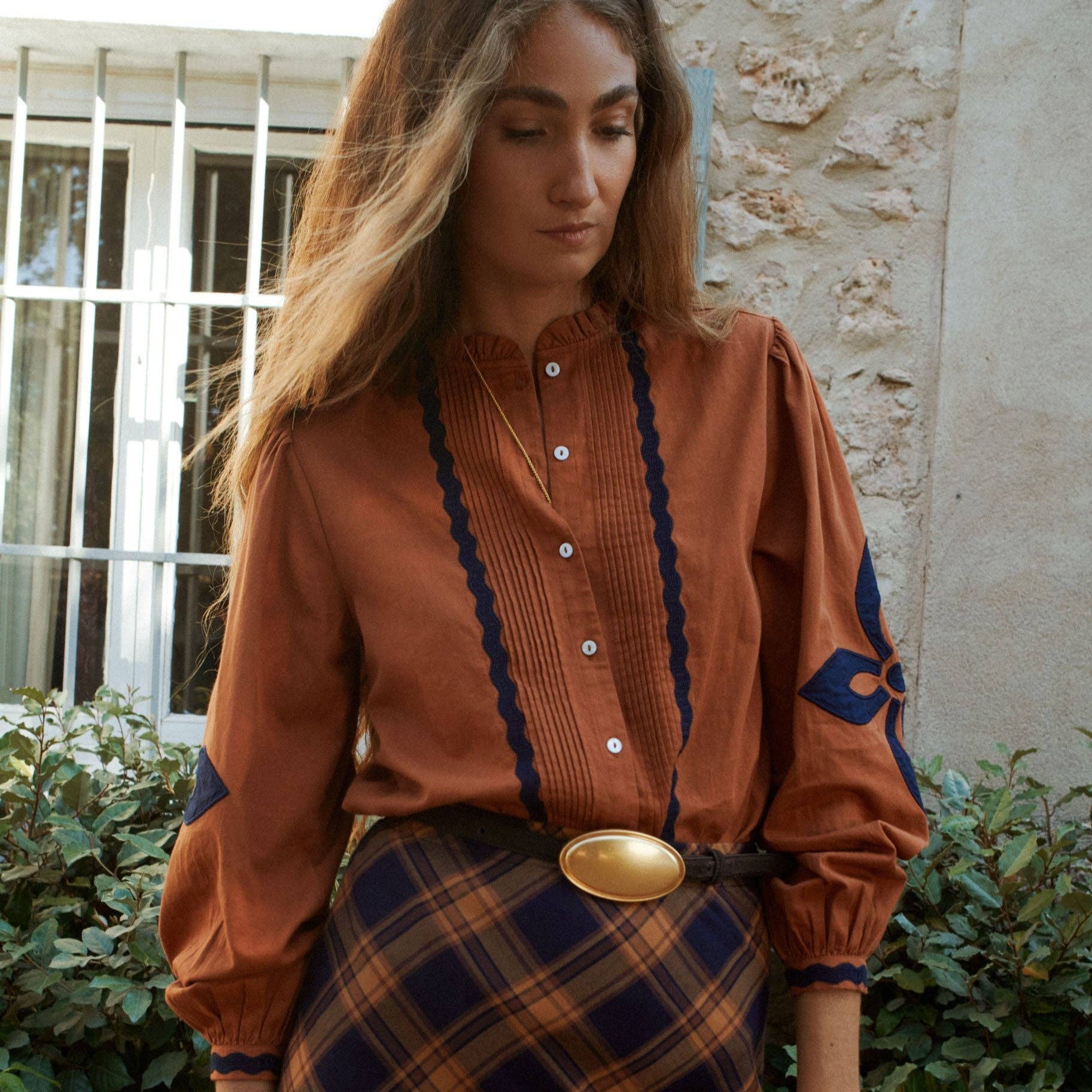Leonor Blouse in Caramel on a white background at Addison West