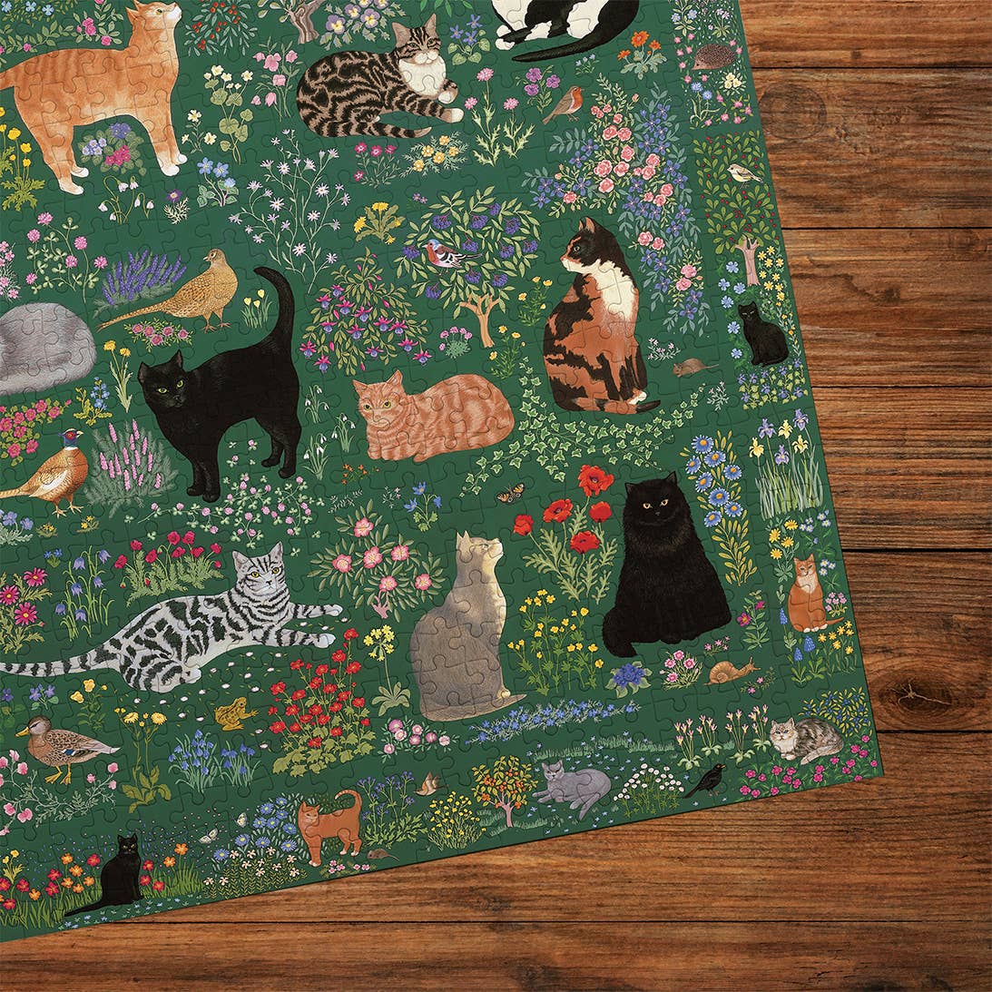 Tapestry Garden 1000 Piece Puzzle on a wood background at Addison West