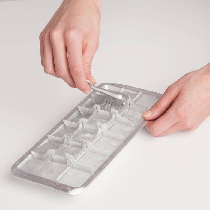 Vintage Lever Ice Tray on a white background at Addison West