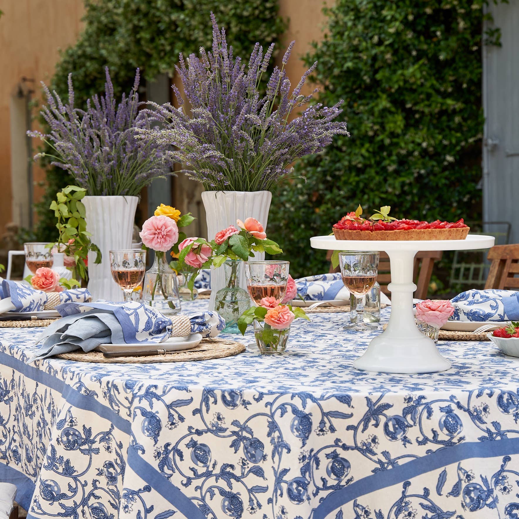 Granada Cornflower Tablecloth 71" x 128" on a table at Addison West