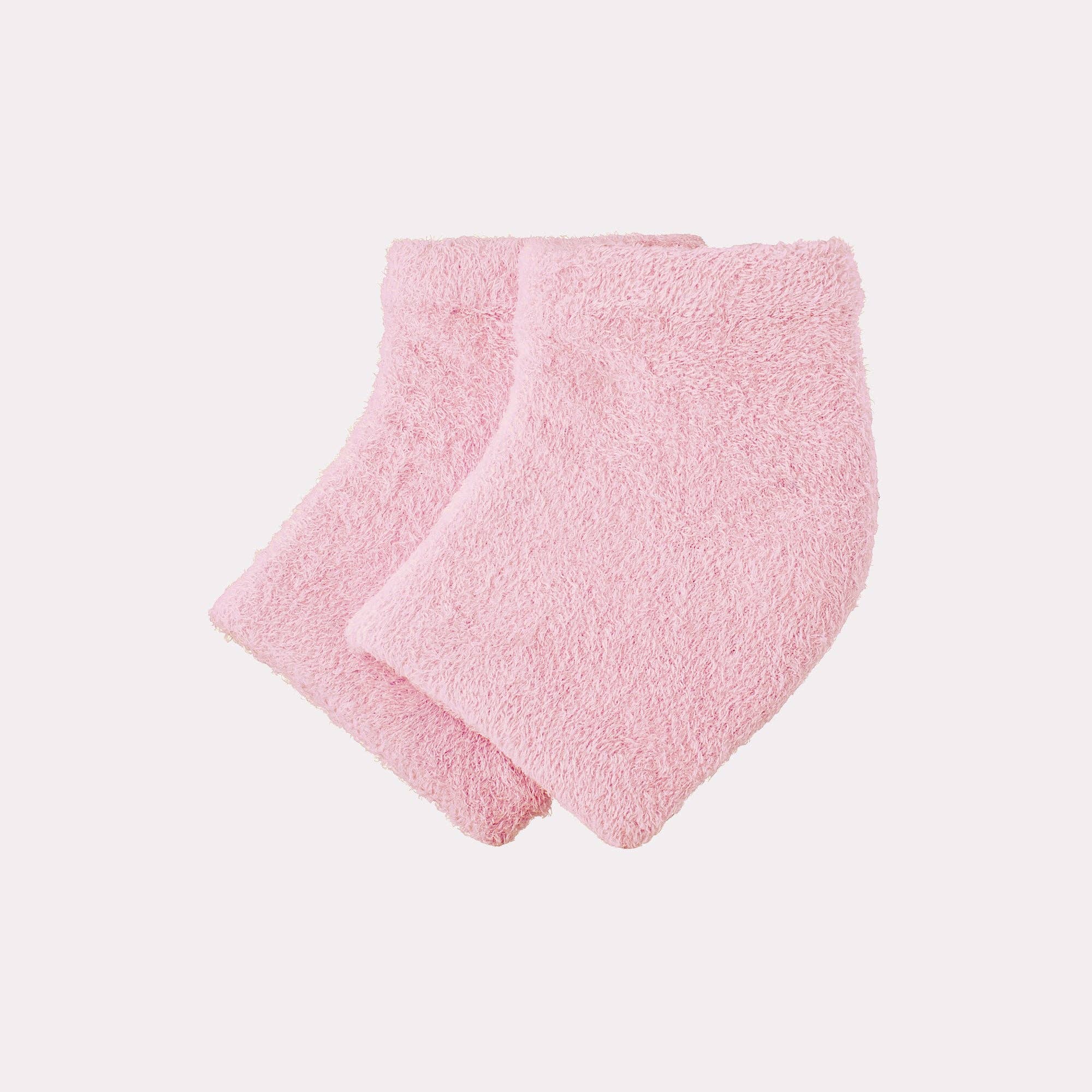 Moisturizing Heel Socks in Pink on a white background at Addison West
