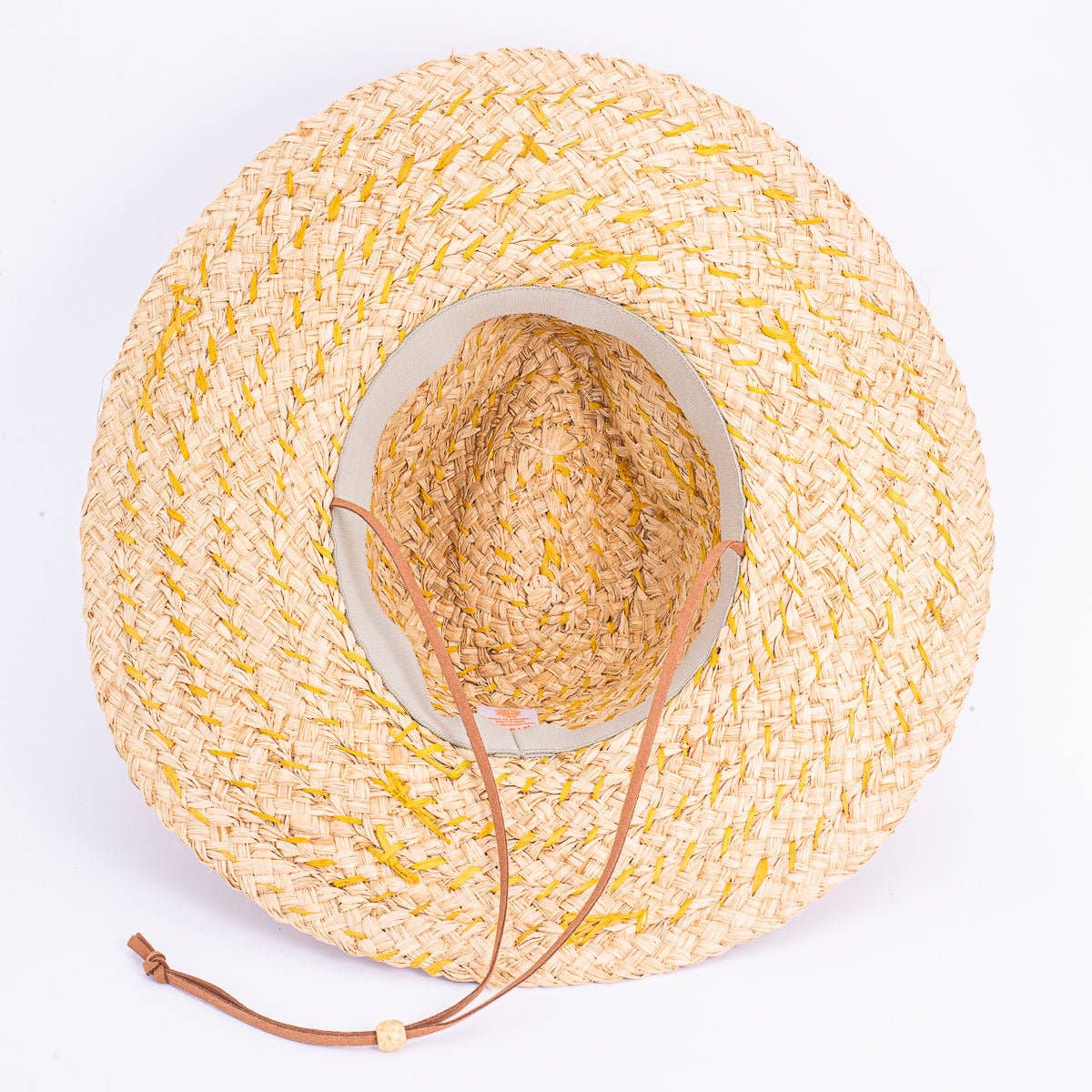 Skiff Sun Hat in Natural on white background at the Addison West.