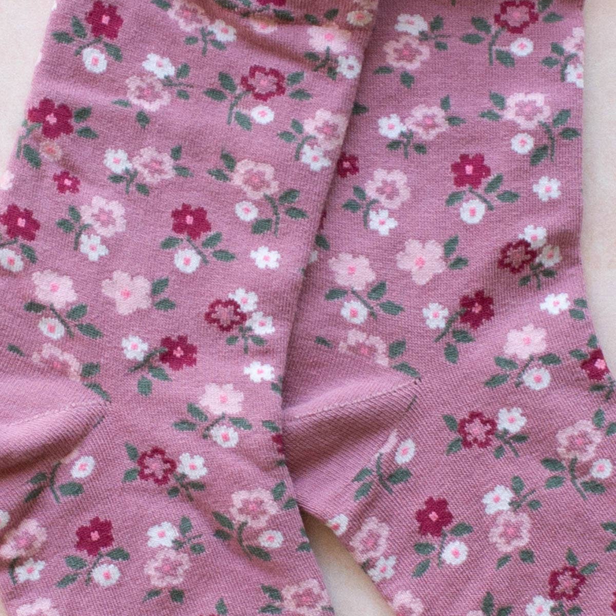 Garden Flower Socks in Pink on a pink background at Addison West