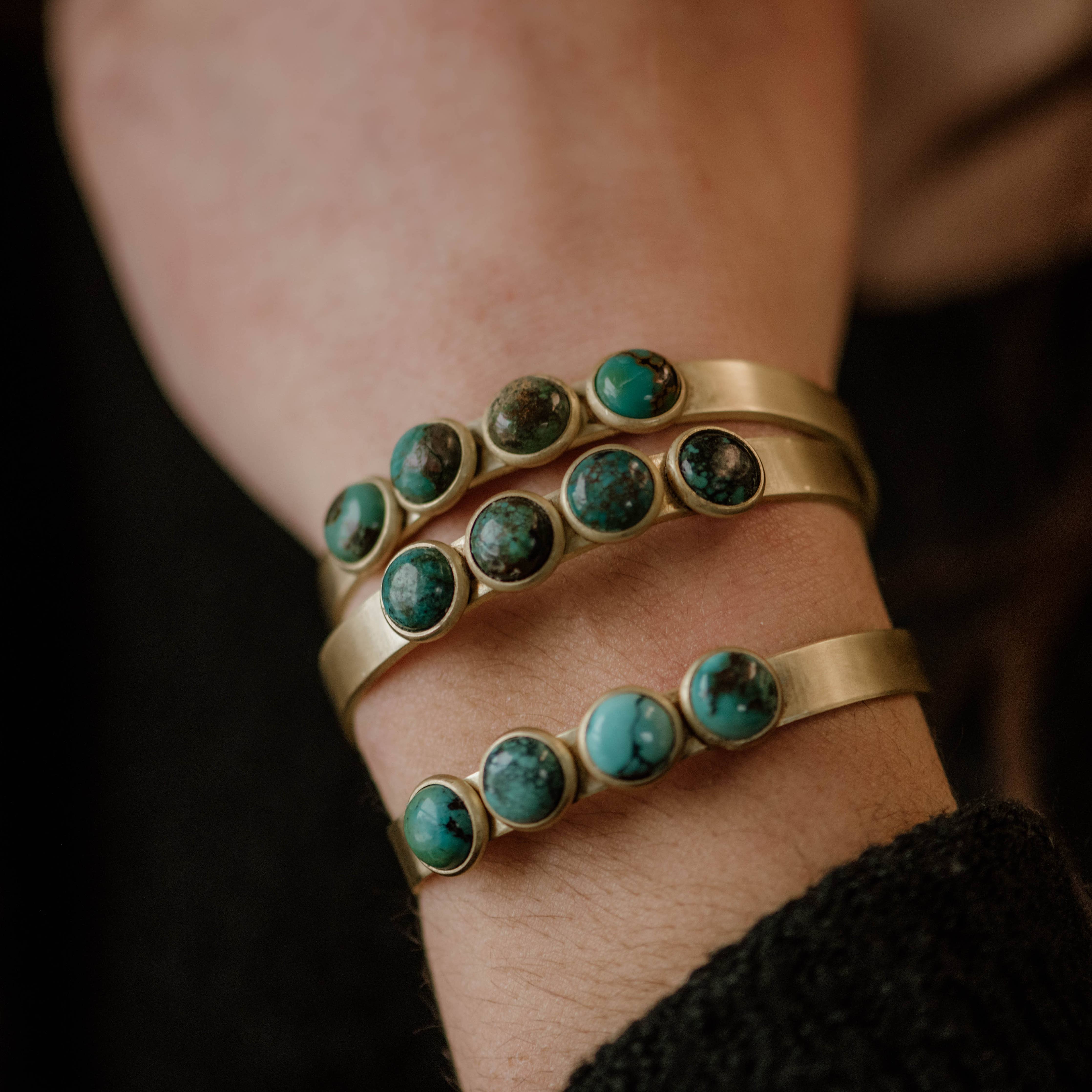 Commonform Bridger Cuff in Turquoise on model at the Addison West.