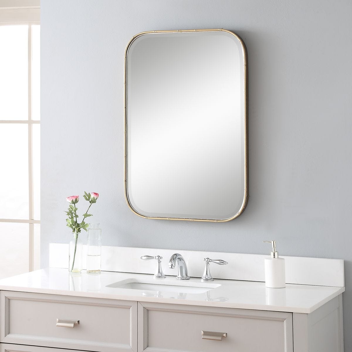 Marwell Vanity Accent Mirror on a white wall in a bathroom at Addison West