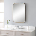 Marwell Vanity Accent Mirror on a white wall in a bathroom at Addison West