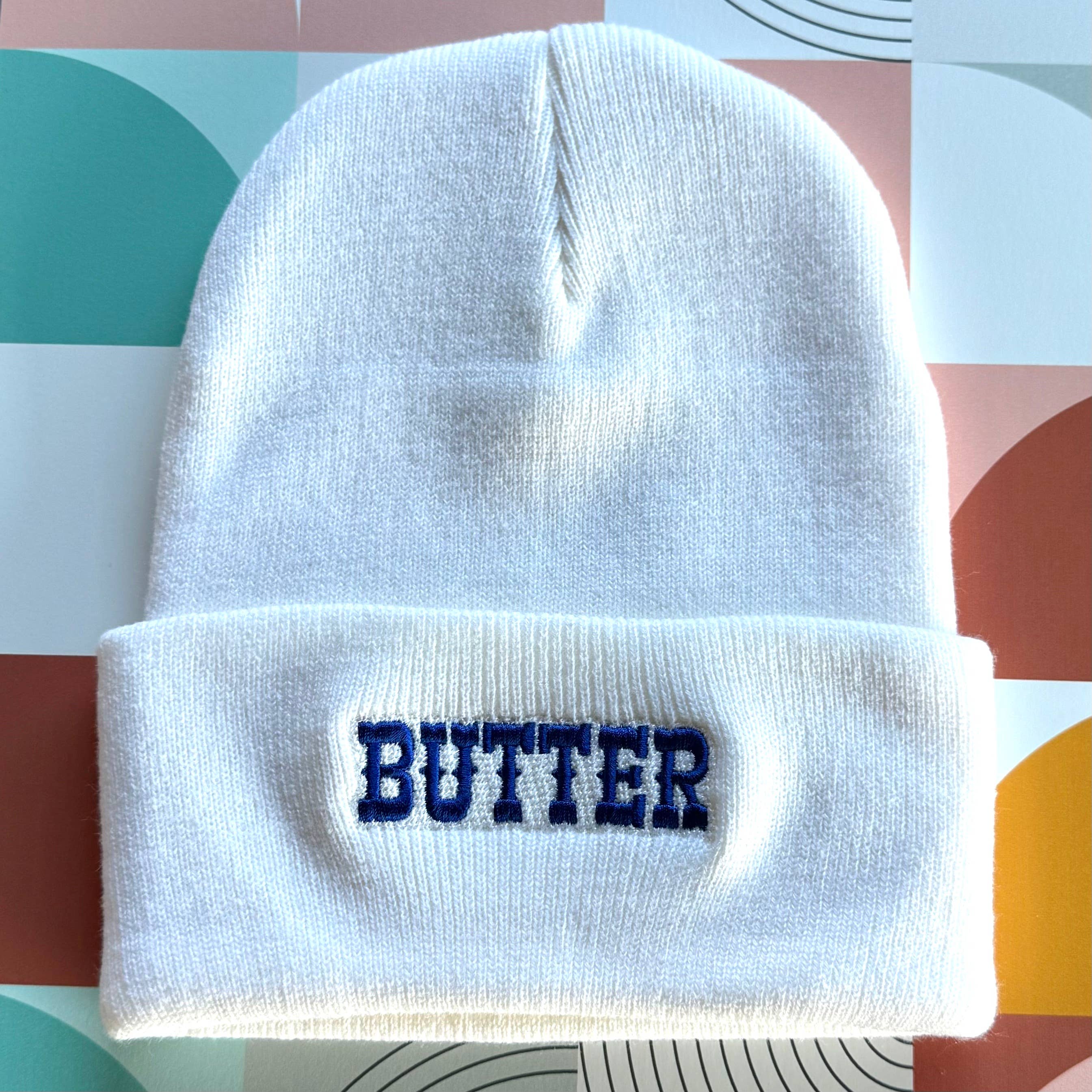 Butter Beanie on a colorful background at Addison West