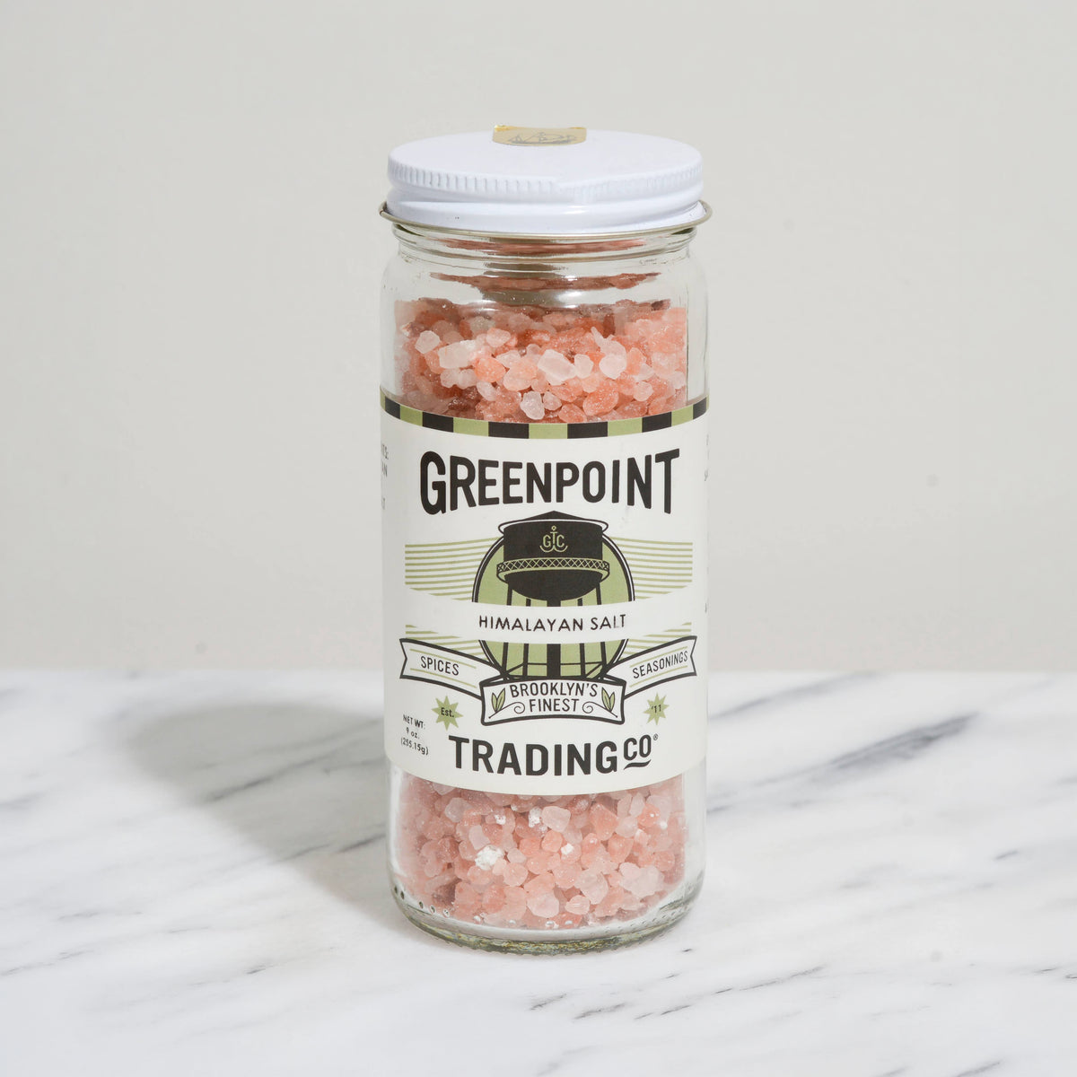 Greenpoint Trading Extra Coarse Himalayan Salt on a white background at Addison West