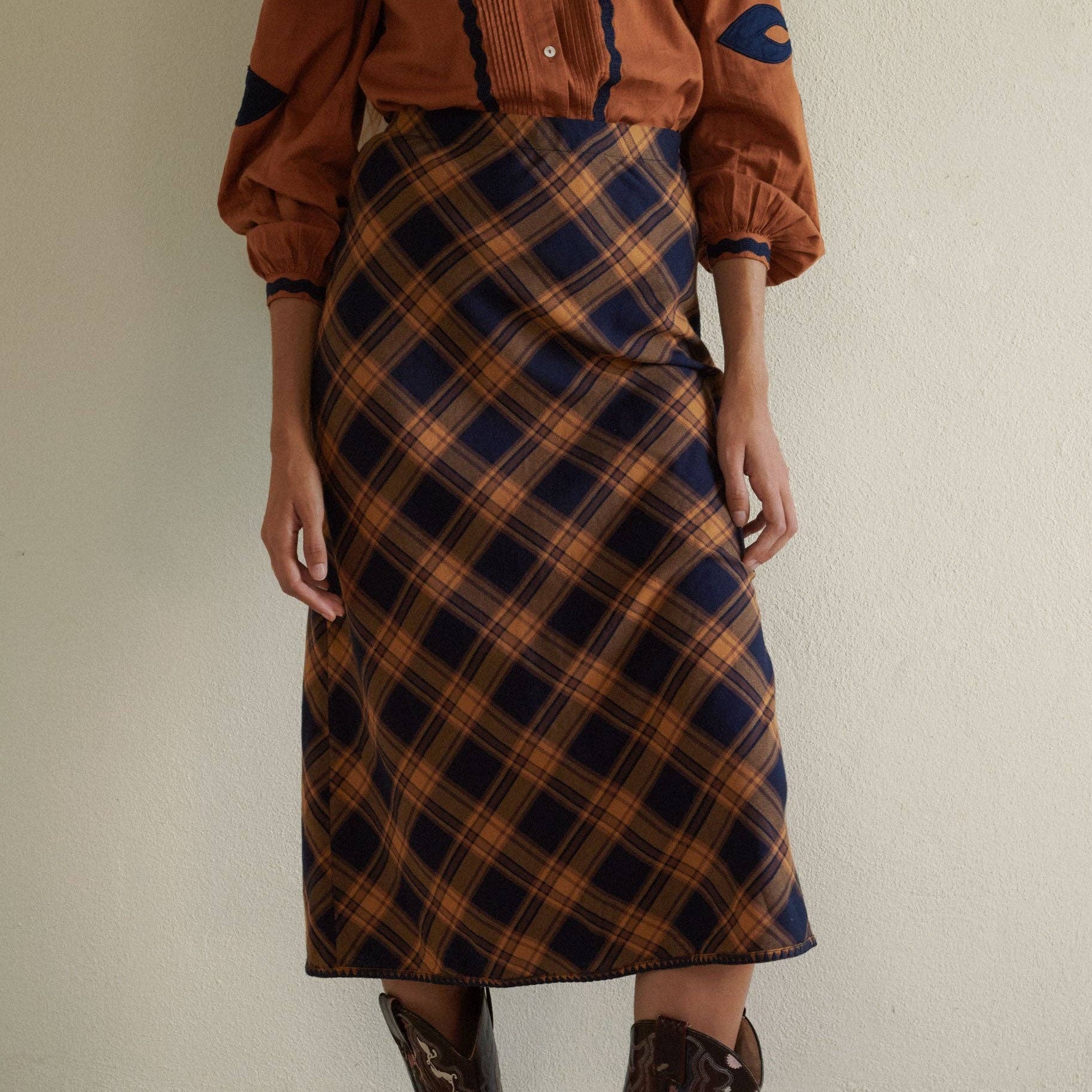 Plaid Midi Skirt on a white background at Addison West