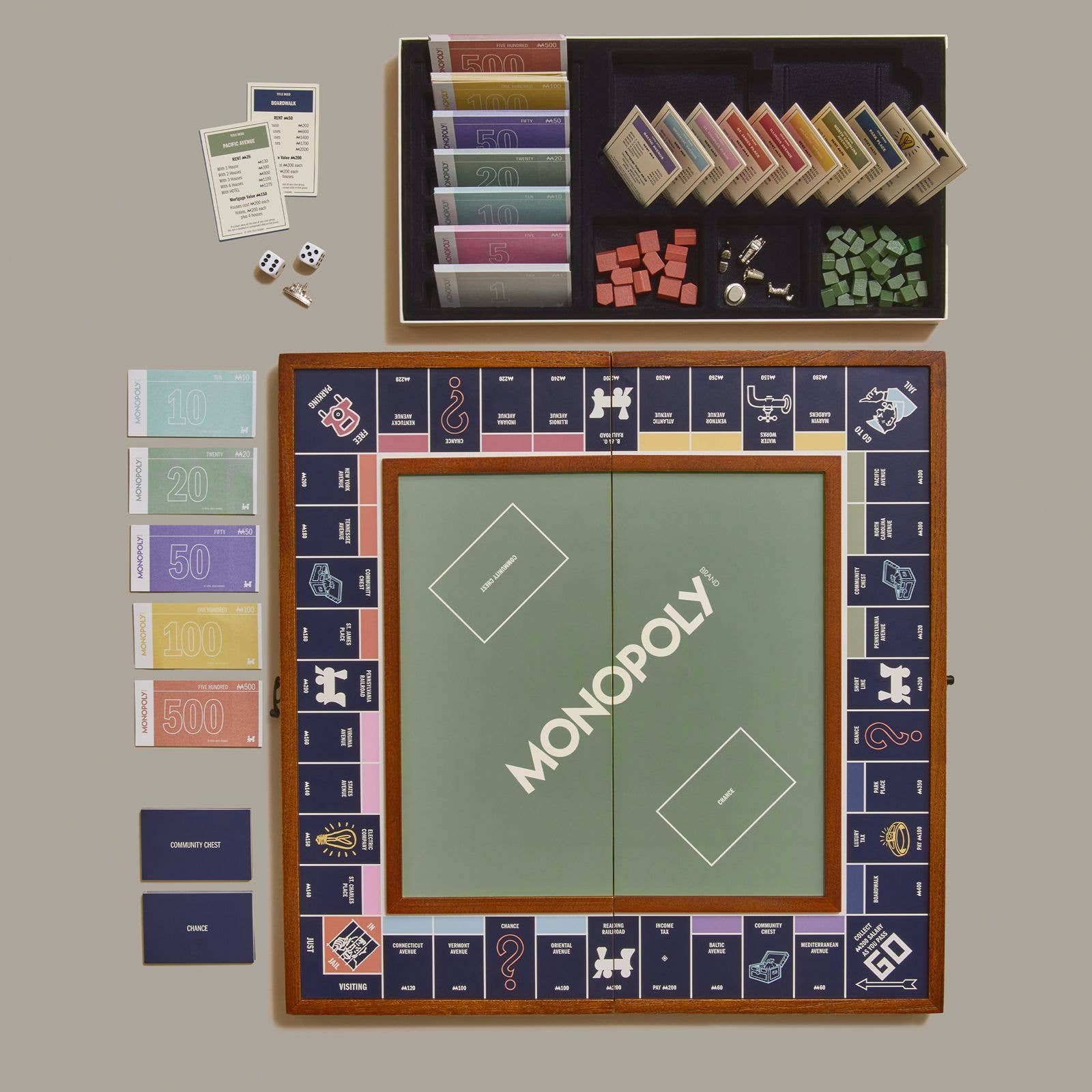 Monopoly Grand Folding Edition on a green background at Addison West
