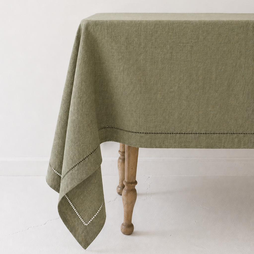 Olive Green Linen Hemstitch Tablecloth, 60 x 90 on a table at Addison West