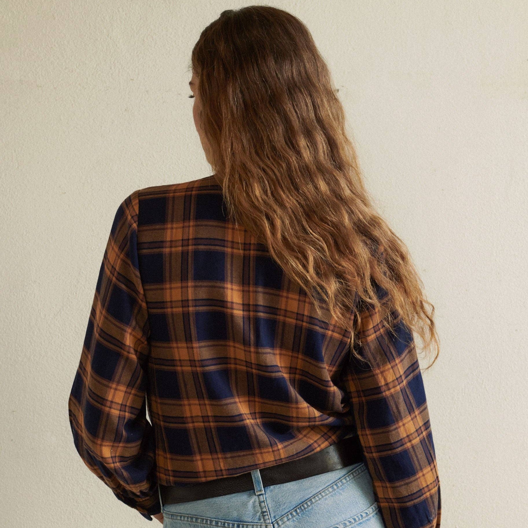 Lily Blouse in Navy on a white background at Addison West