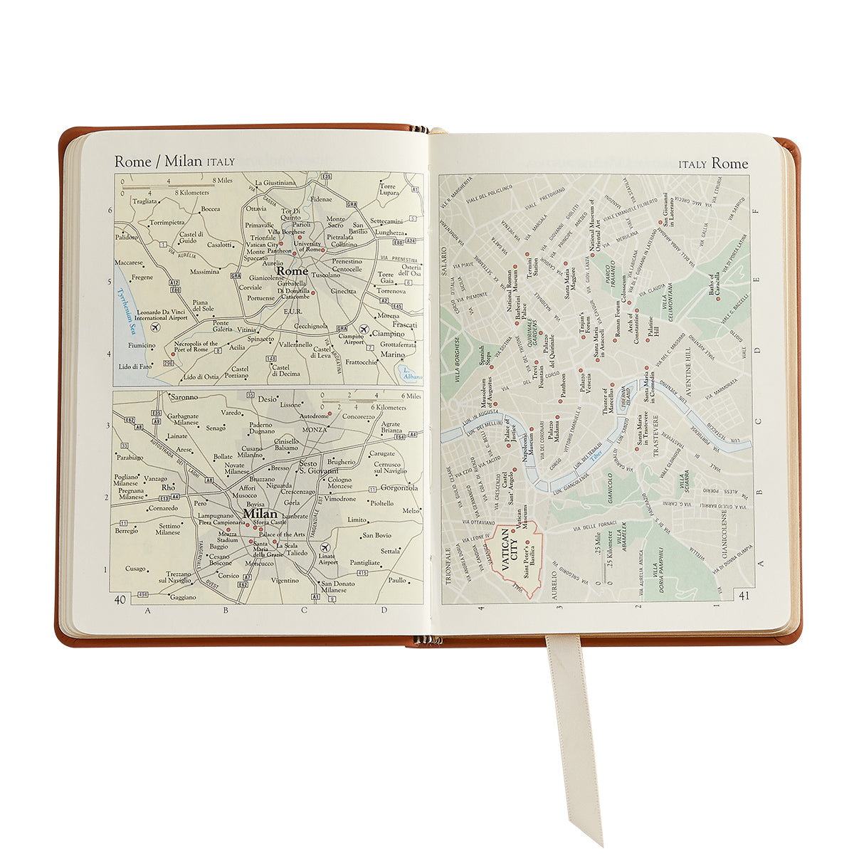 The Traveler's Atlas Cognac Leather on white background at Addison West.