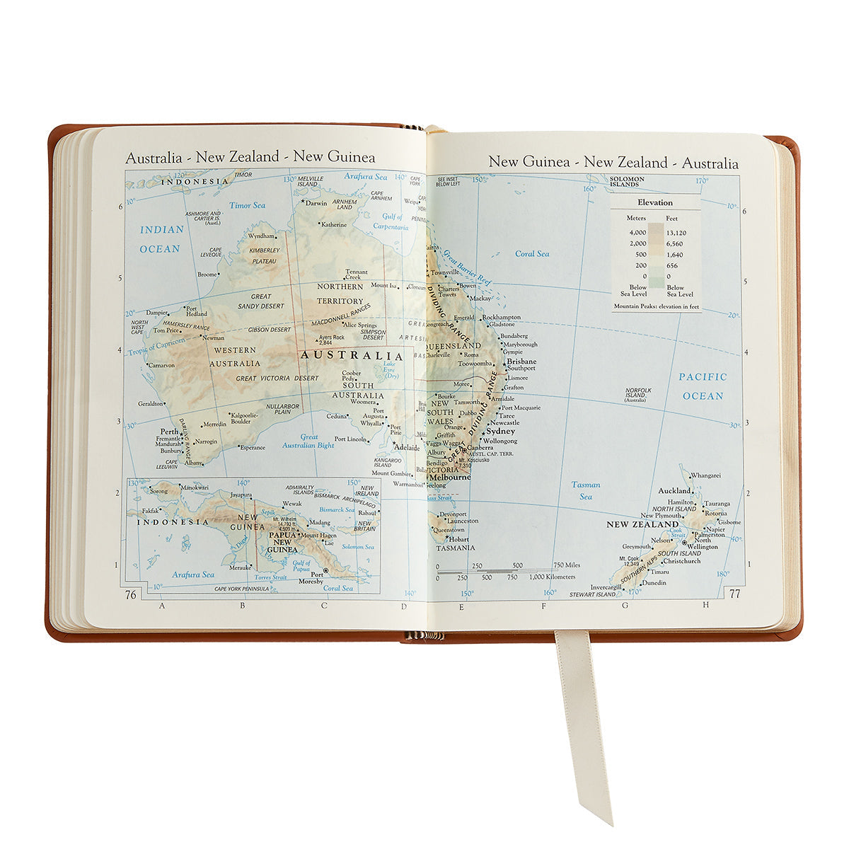 The Traveler's Atlas Green Leather on white background at Addison West.