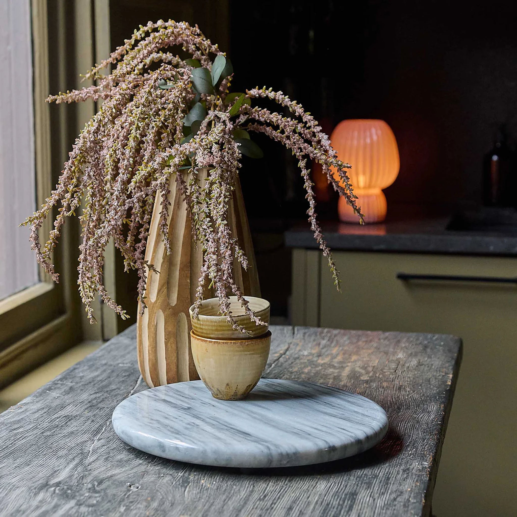Abigail Ahern Faux Amaranthus in Blush on a wood table at Addison West