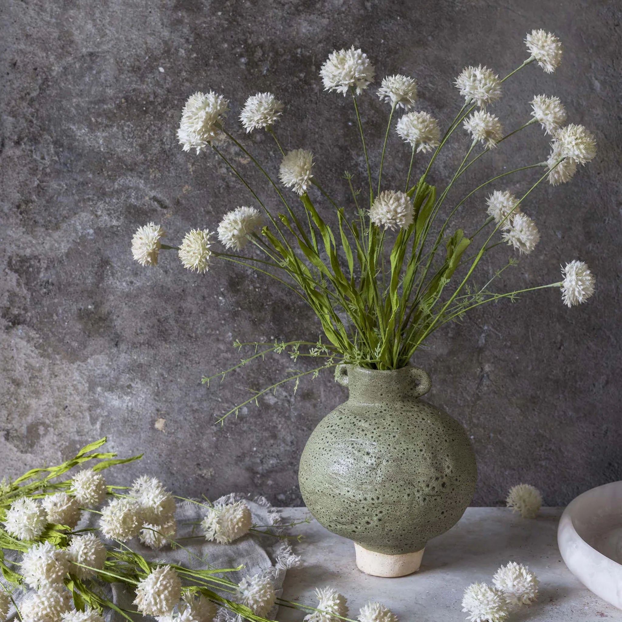 Abigail Ahern Faux Large Melaleuca in Cream on a grey background at Addison West