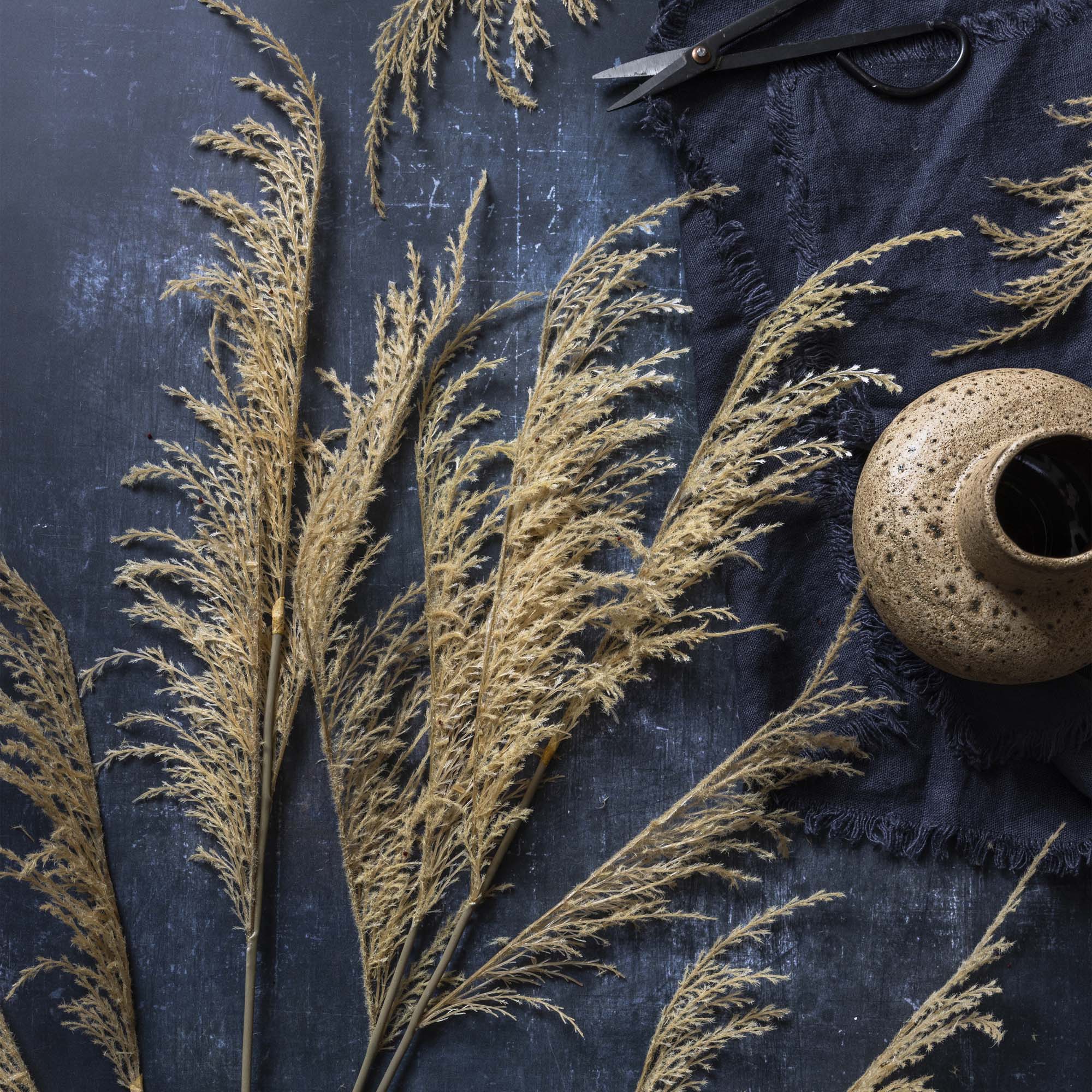 Abigail Ahern Faux Wild Grass in Oat on a grey background at Addison West
