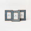 Three picture frames with blue textured finish on a white background