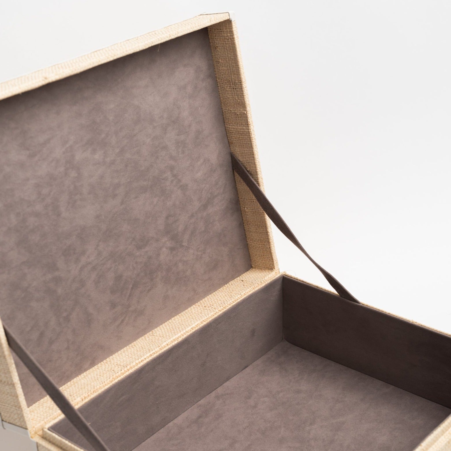Raffia Box with Leather Trim small open to show lining on a white background from Addison West