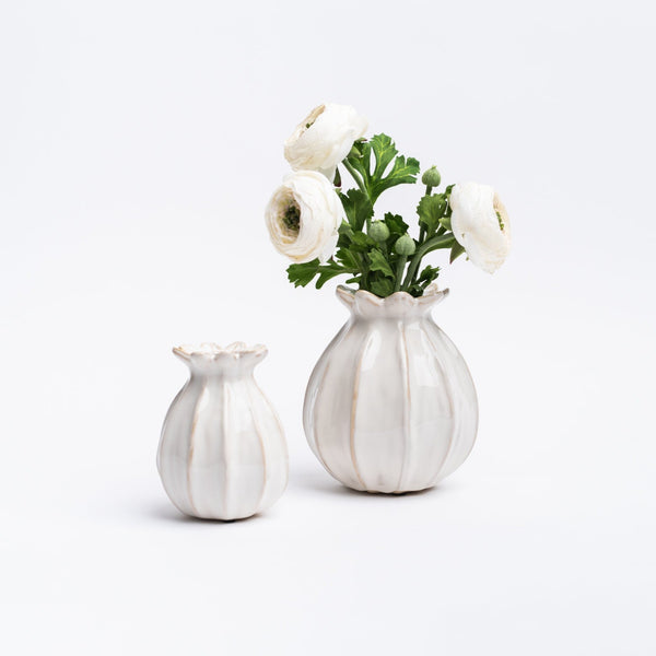 Small and large sculpted bud vase in white from Addison West home goods on a white background