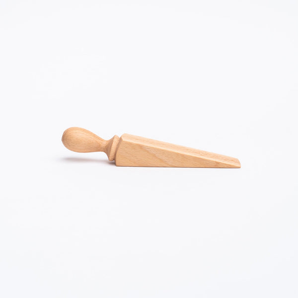 Small wood door wedge by Creamore Mill on a white background