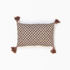 French Knot Tassels Petite Lumbar Pillow on a white background at Addison West