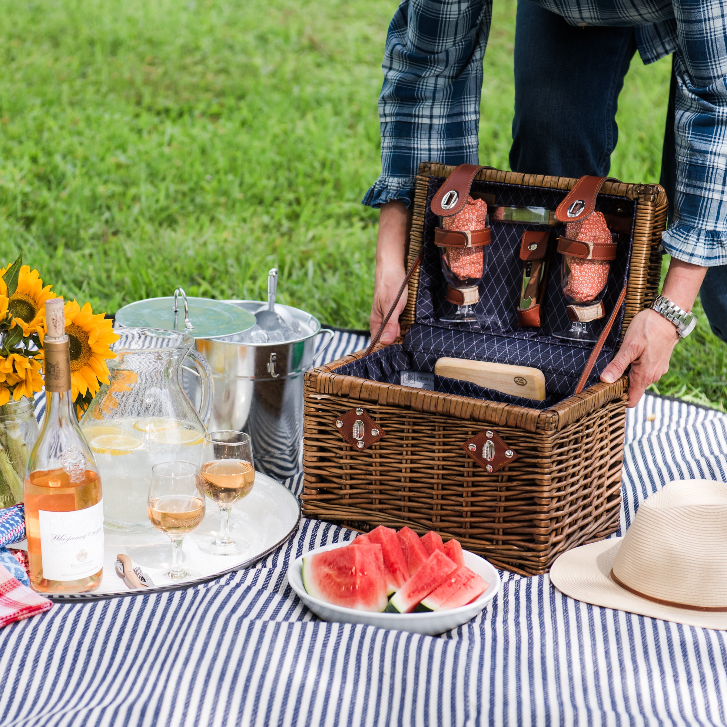 Wine & Cheese Picnic Basket on a picnic blanket with a model at Addison West